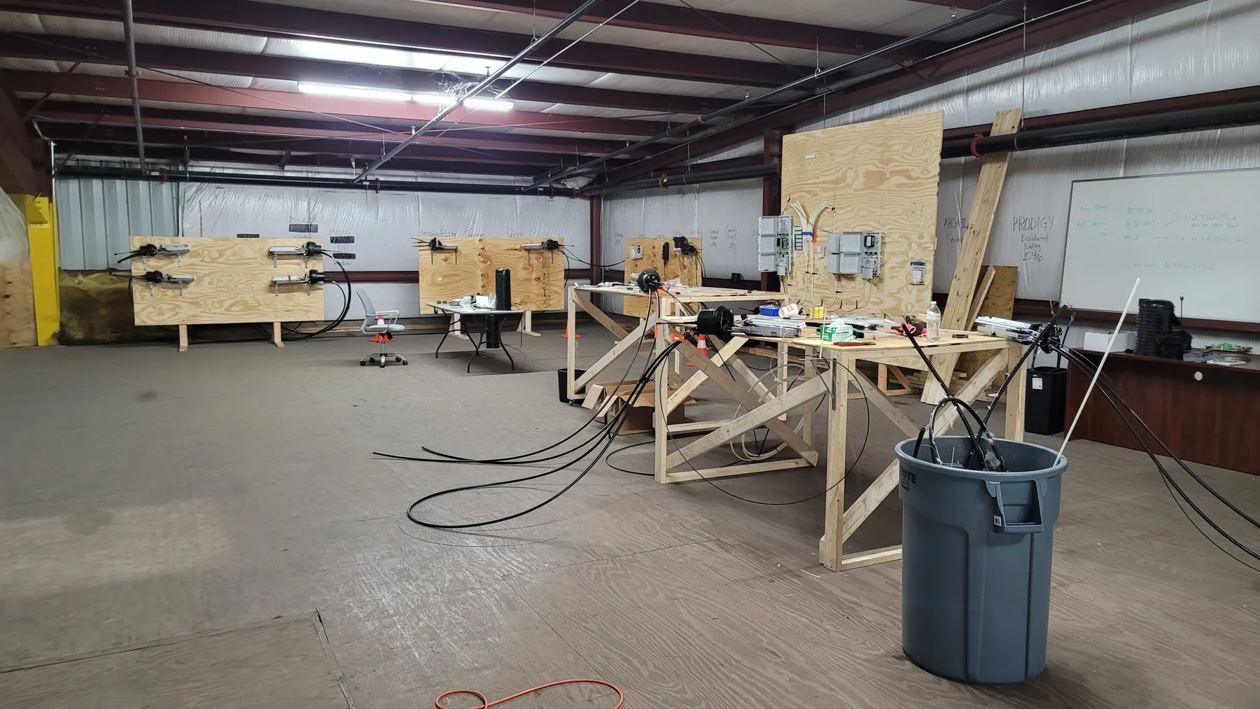 Training still: shop benches and plant boards