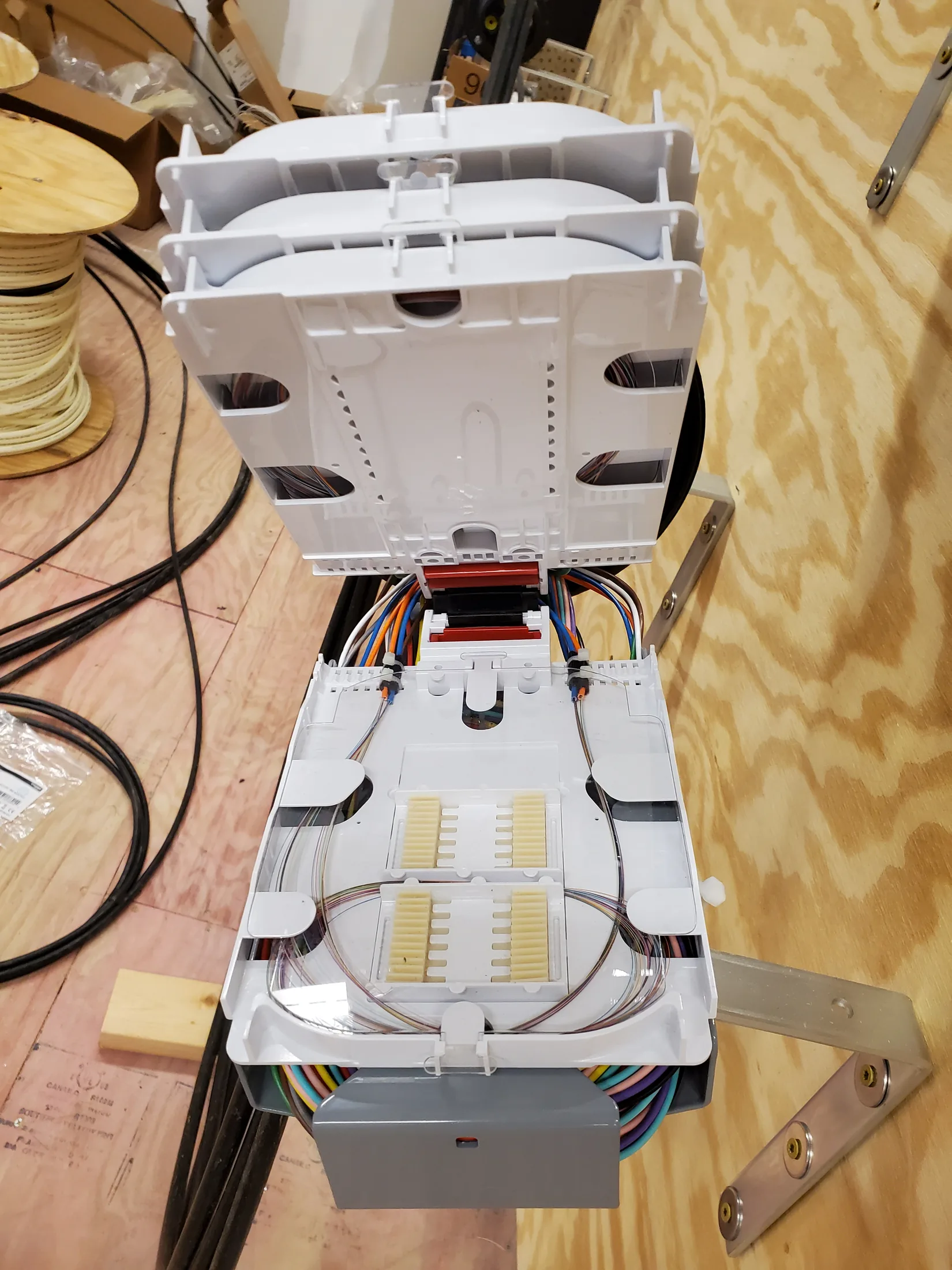 Issued lab still, 2020-05-14: open white enclosure on plywood