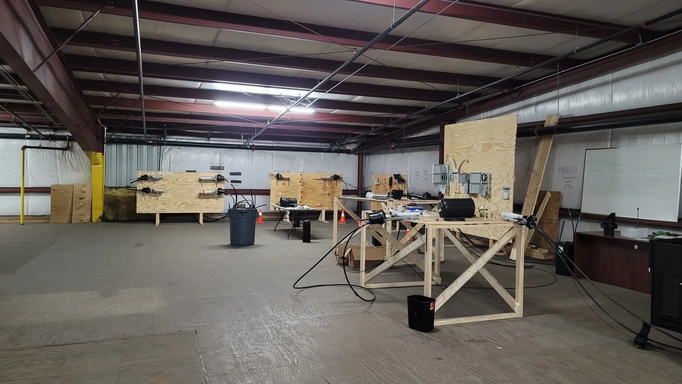 Issued lab still, 2020-09-29: lab overview with whiteboard notes and plywood stations